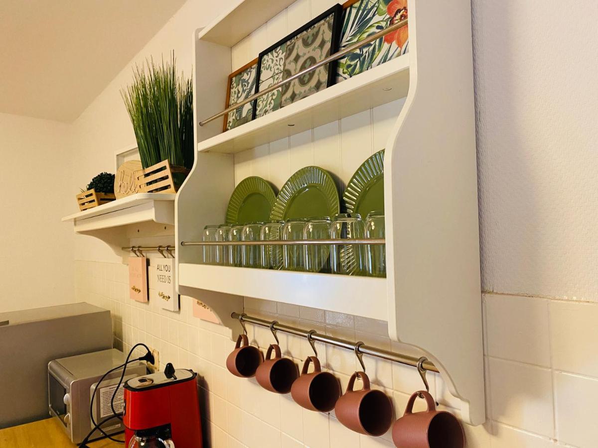 Tm Aparts Dortmund Buitenkant foto A wall-mounted plate rack